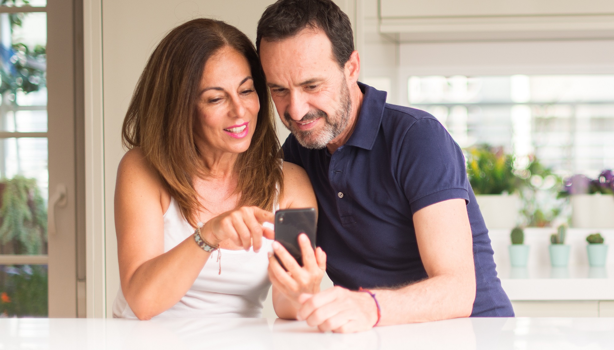 Couple viewing real estate listings